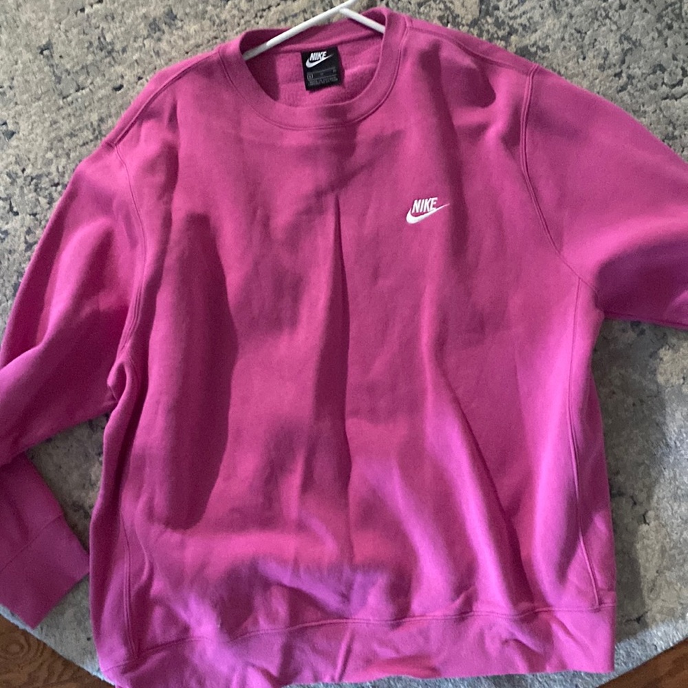 Pink Nike sweatshirt